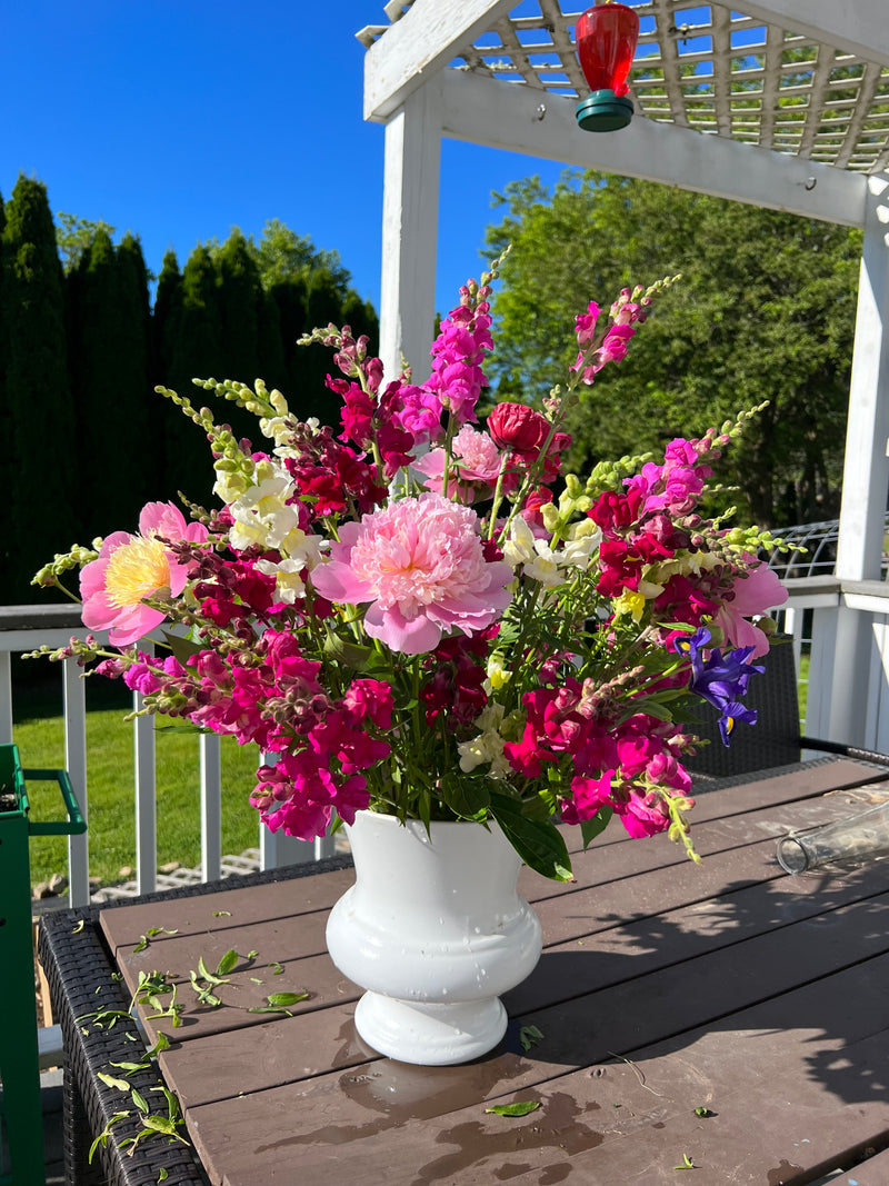 Tall white urn arrangement