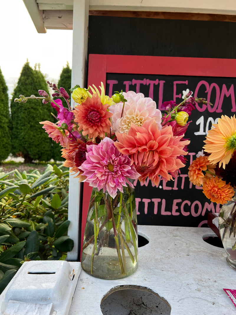 Peach and magenta jar at the stand