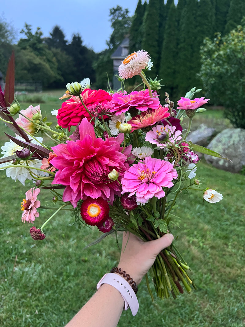 Bouquet held up at dusk